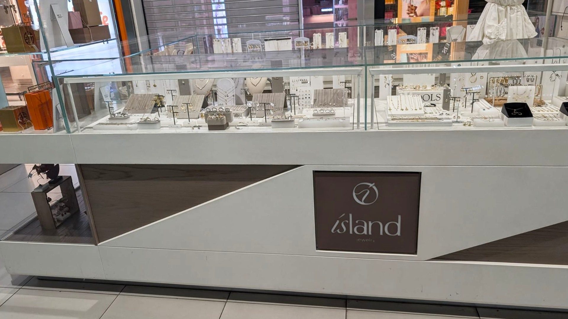 Island Jewelry kiosk signage at Metro Mall
